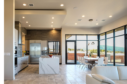 Peek into the kitchen and living area of the New Mexico home equipped with 2GIG Security System